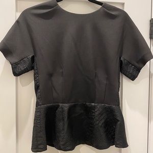 Black peplum top with faux snake print